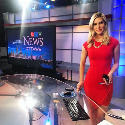 Megan Shaw on set in red dress